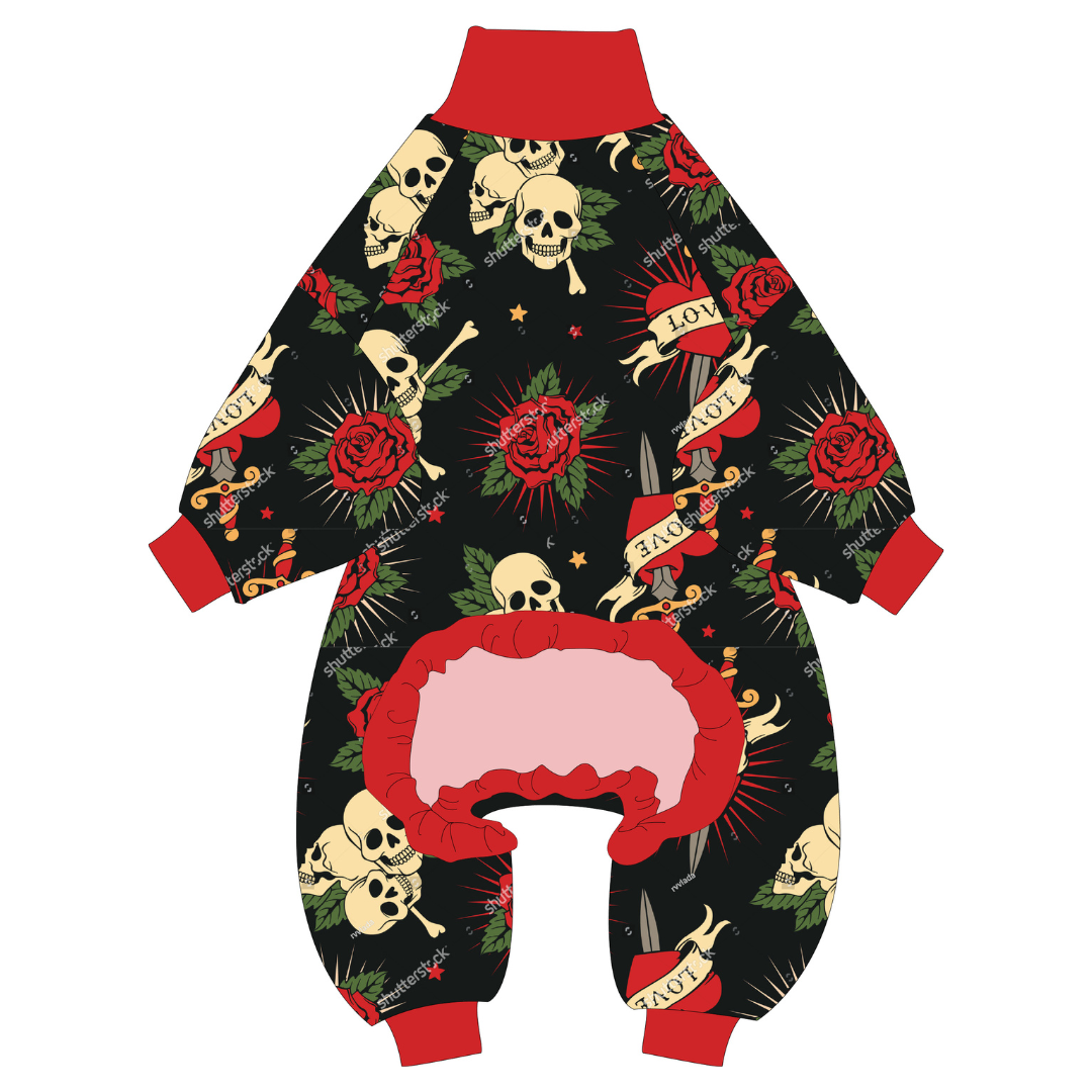 Flat lay of black dog PJs with skulls and roses to show full design
