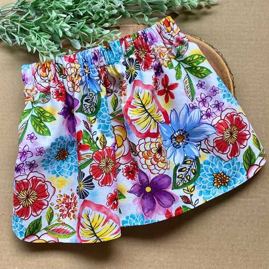 Summer Bouquet Dog Skirt by Bully Love Boutique features a colorful floral design on lightweight fabric, perfect for warm weather.