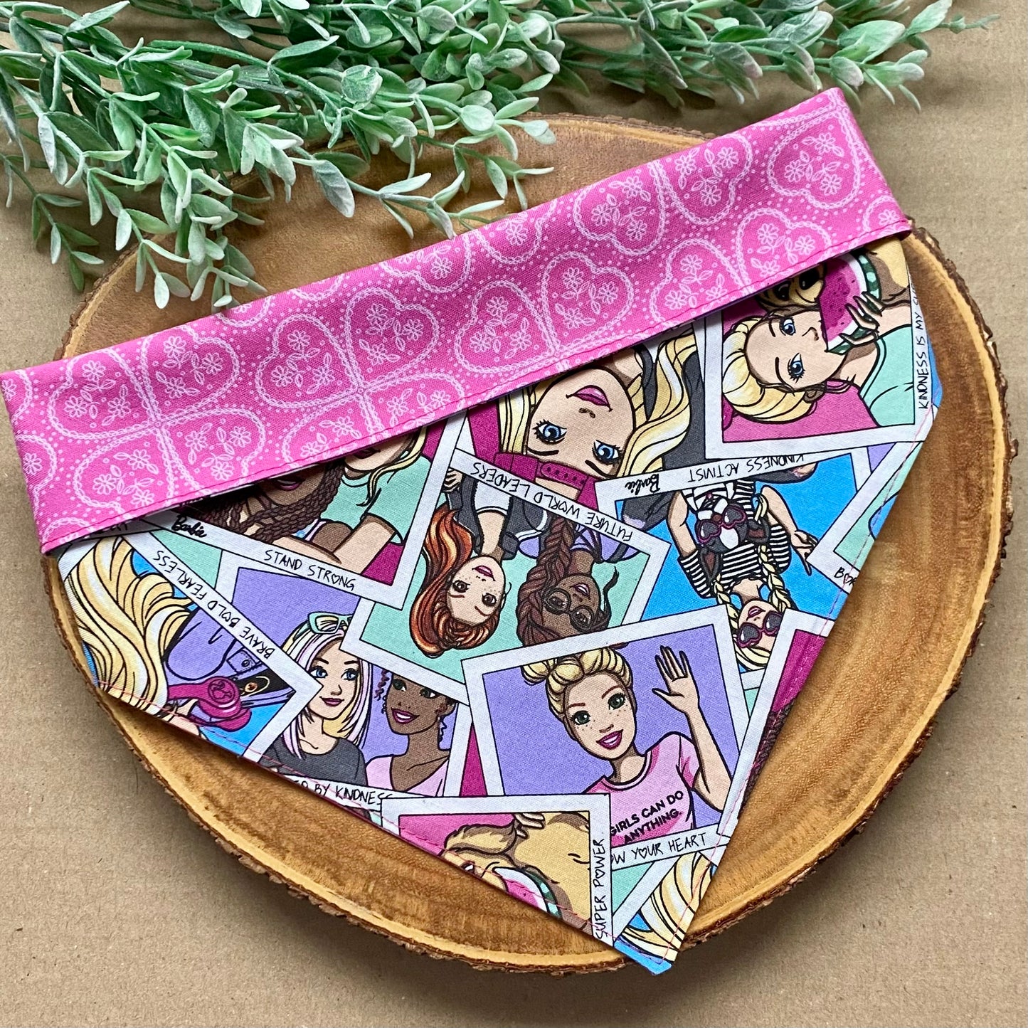 Cute dog wearing a pink Barbie & Friends dog bandana from Bully Love Boutique, showcasing playful and stylish pet accessories.